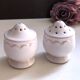 Vintage porcelain salt and pepper shaker duo