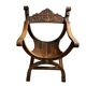 Fauteuil dit Dagobert en bois sculpté vers 1900
