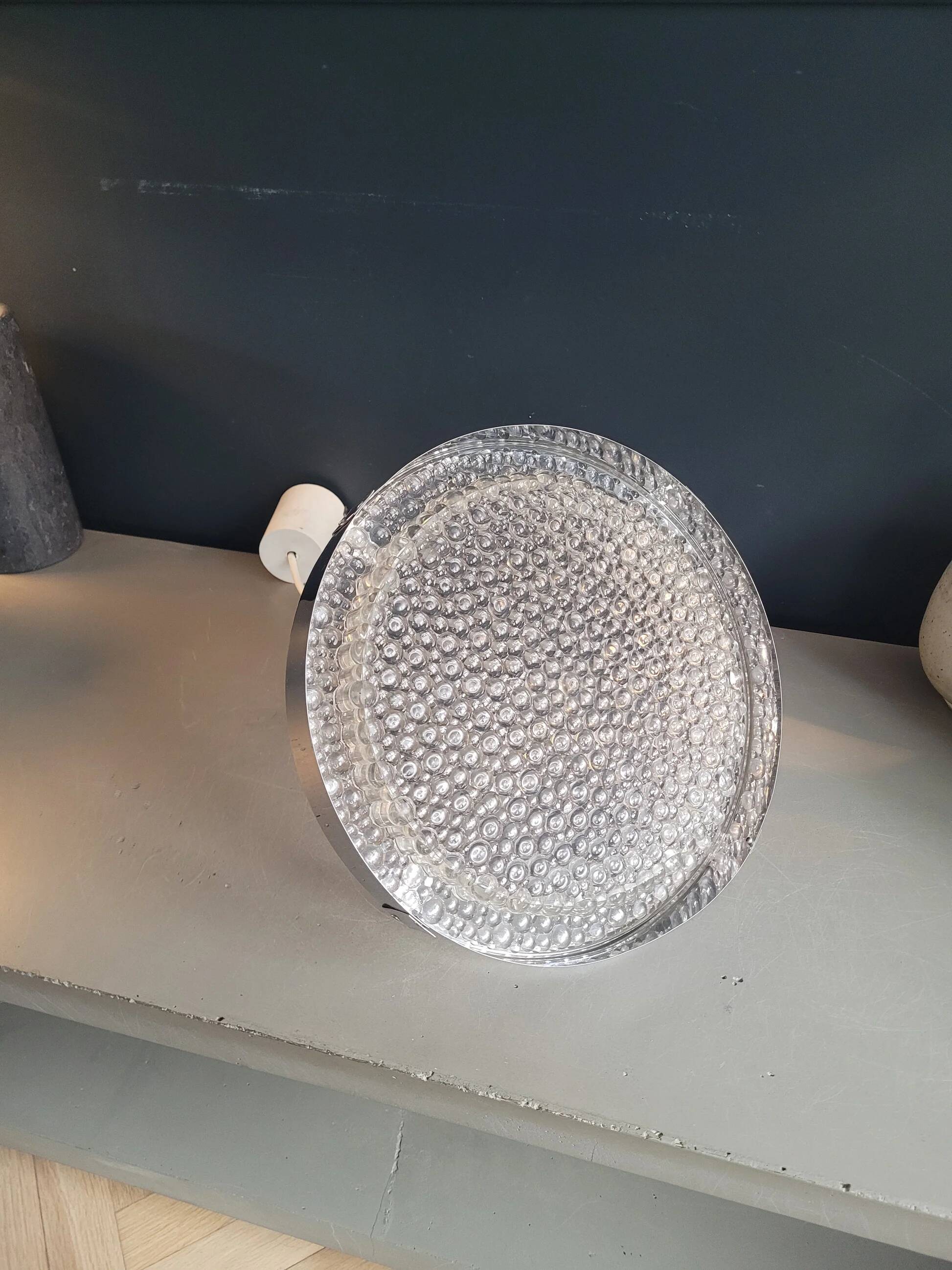 Suspension space-age in plastic bubble and aluminium