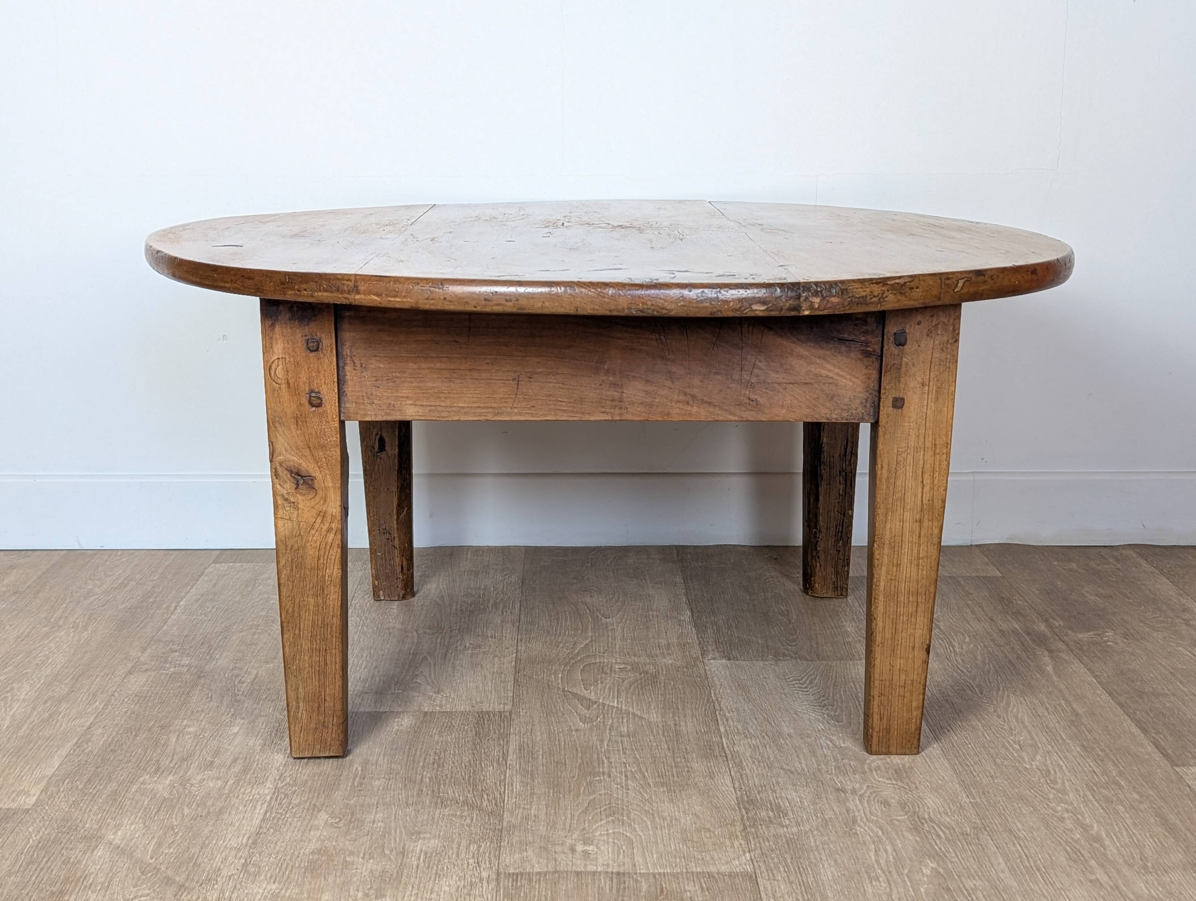 Round walnut coffee table