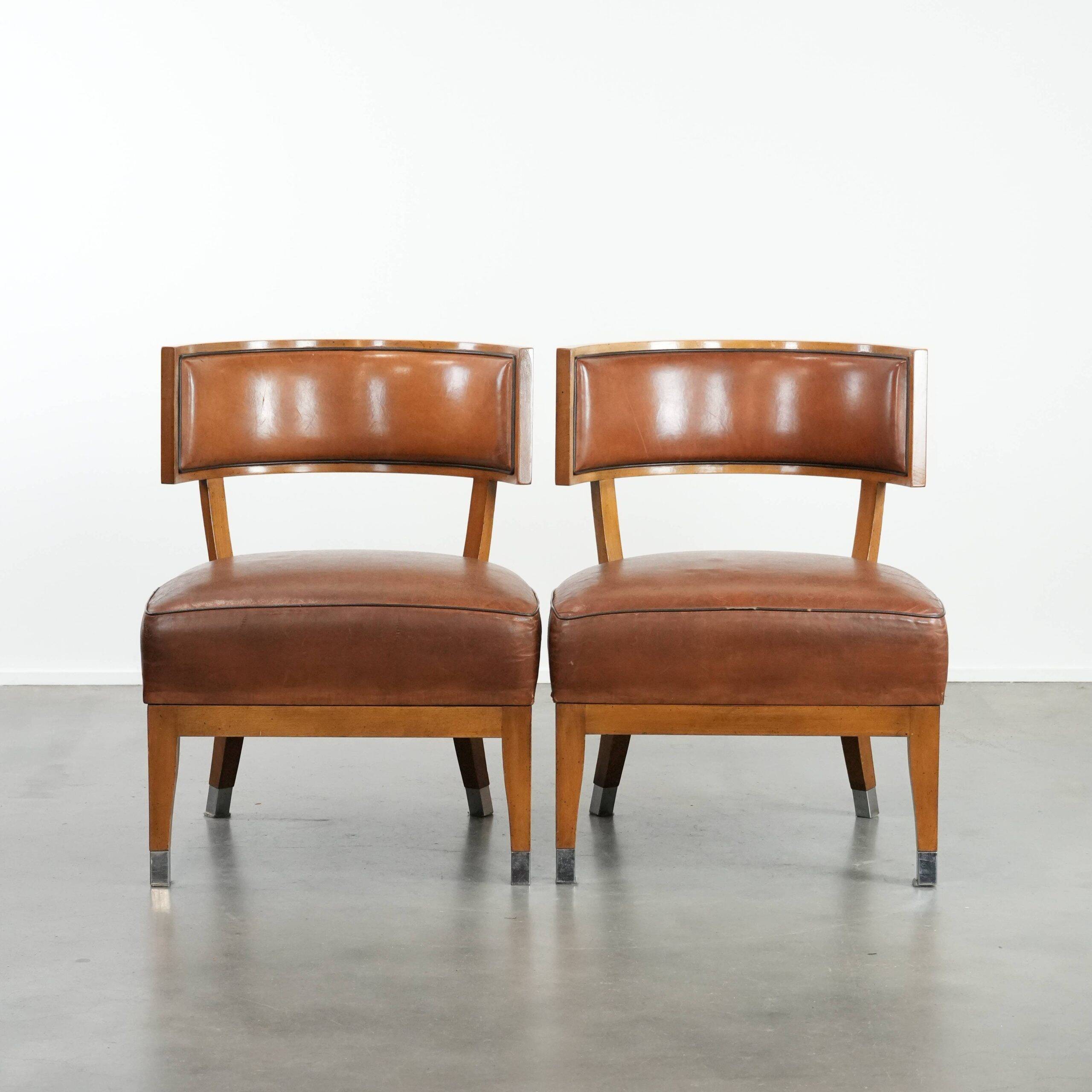 Set of 2 vintage design cocktail chairs/armchairs made of sheepskin leather