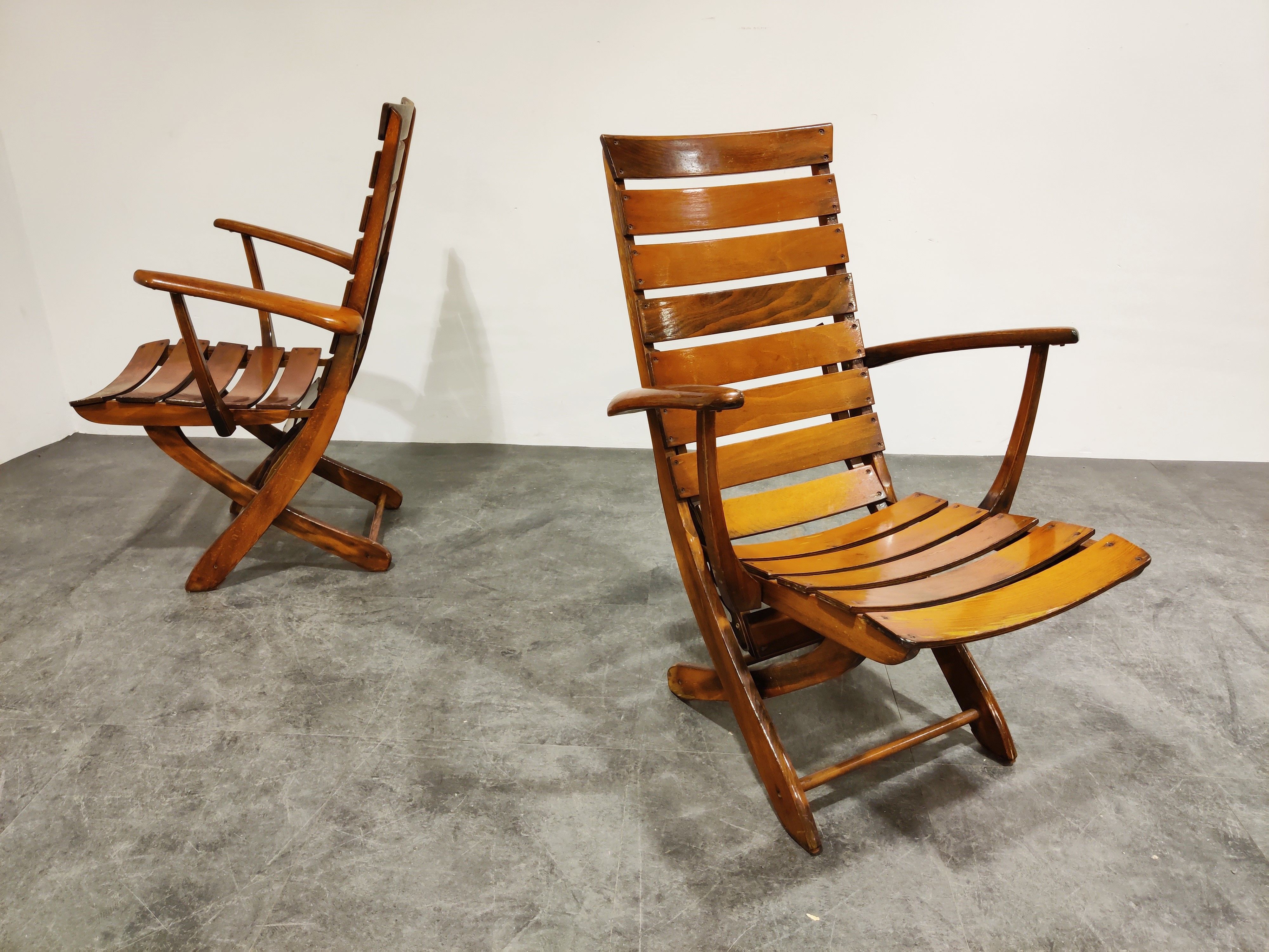 Pair of wooden folding garden chairs with table, 1950s