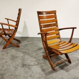 Pair of wooden folding garden chairs with table, 1950s