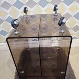 Michel Dumas smoked Plexiglas rolling table.