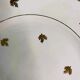 11 plates in antique earthenware decorated with golden leaves and golden border