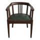 Office chair in oak and green faux leather.
