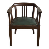 Office chair in oak and green faux leather.