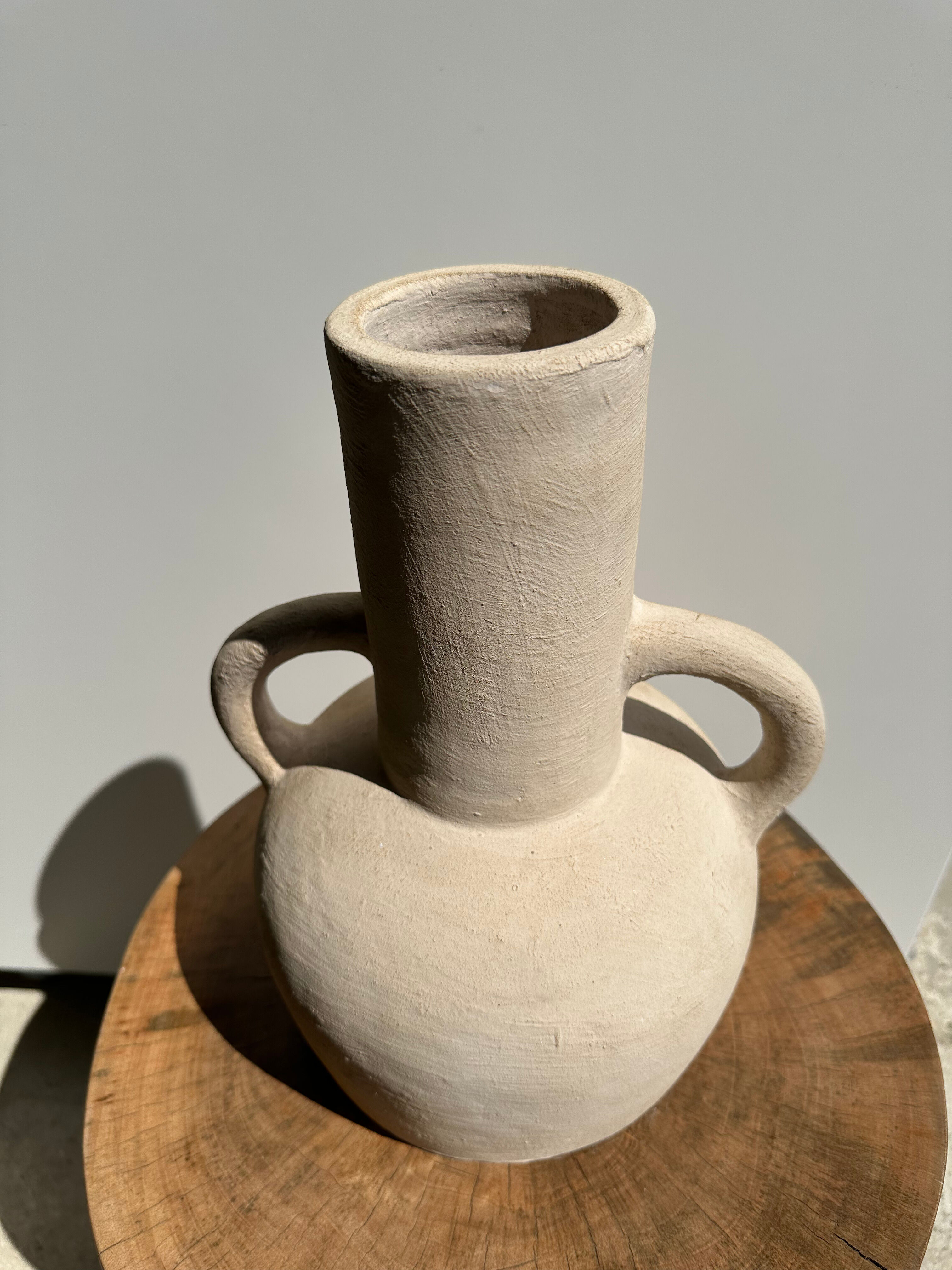 Handmade terracotta vase painted in beige with double handles h:32 d:25