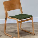 A set of four chairs in light oak (Theo chairs by Chorus)