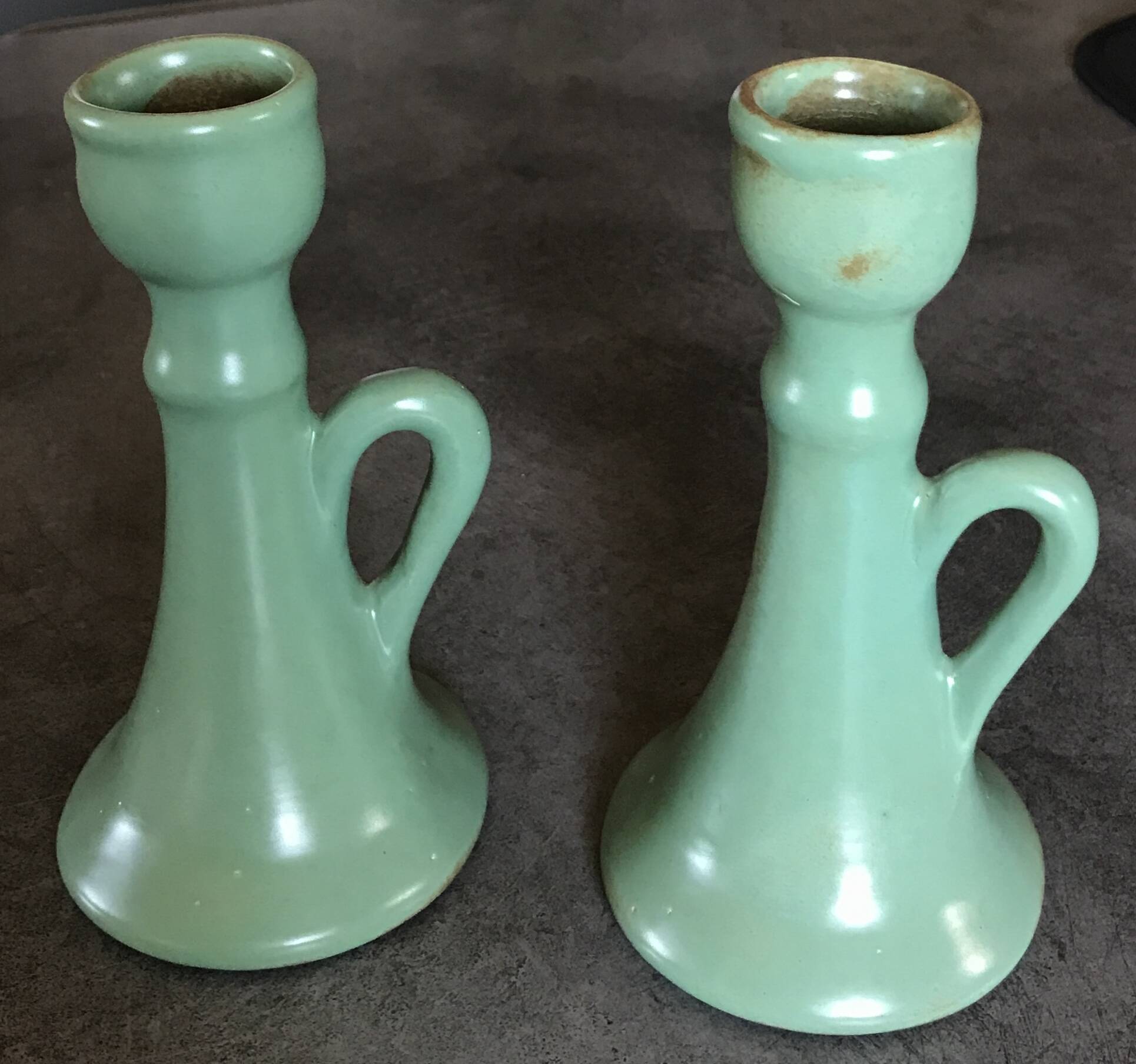 Pair of vintage table candle holders in green enameled ceramic