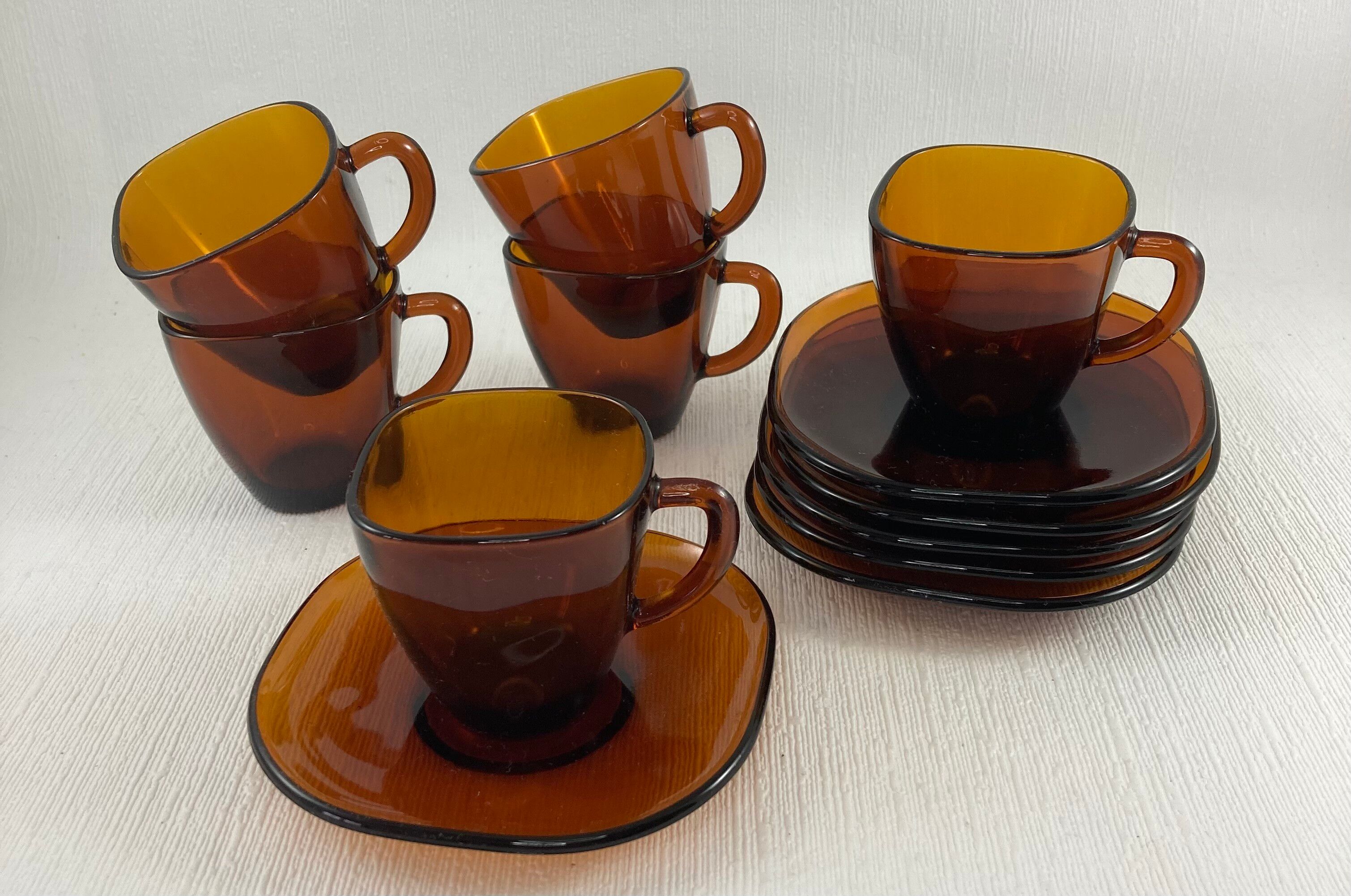 Service of 6 coffee cups and saucers Vereco amber glass design 1970