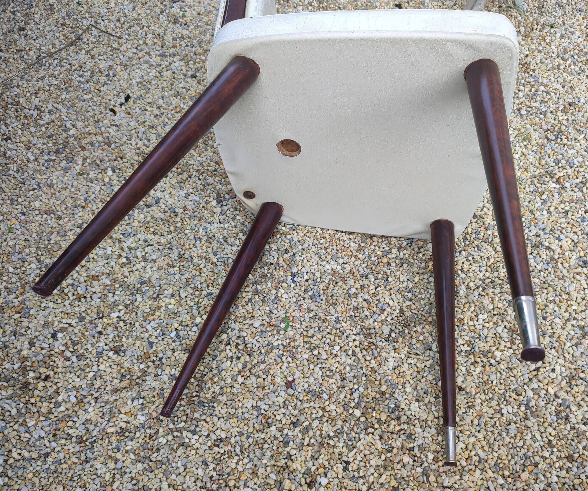 Set of 4 Vintage Mid-Century Modern Chairs with tapered metal legs.