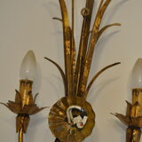 Golden metal wall sconce