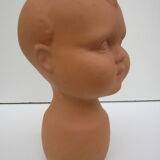 Terracotta vase: child's head