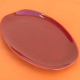 Oval serving dish burgundy-coloured glazed ceramic