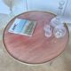 Round brass and wood coffee table