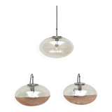 Suspended UFO-shaped glass luminaires in mid-century German Space Age style, set of 3.