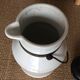 Antique milk jug