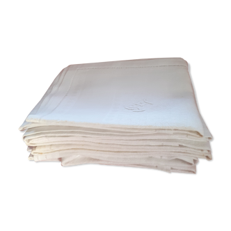 Set of 6 white damask hemmed napkins with handmade stitching and monogram.