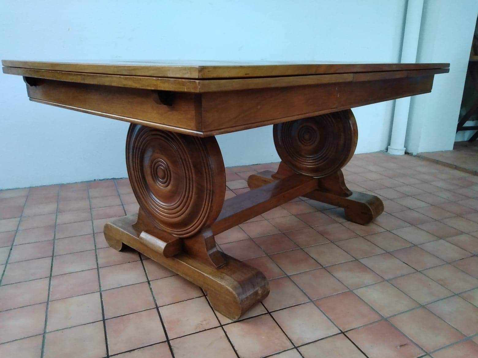 Table from the 1940s in solid oak in the style of Victor Courtray.