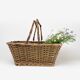 Old basket made of woven wood splices and braided wicker