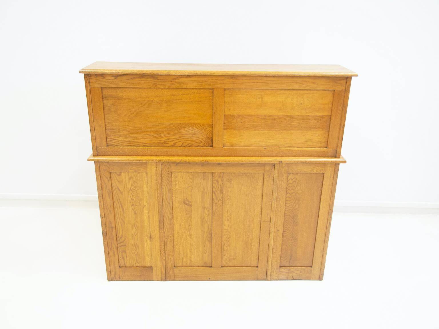 Oak roll-top desk with drawers