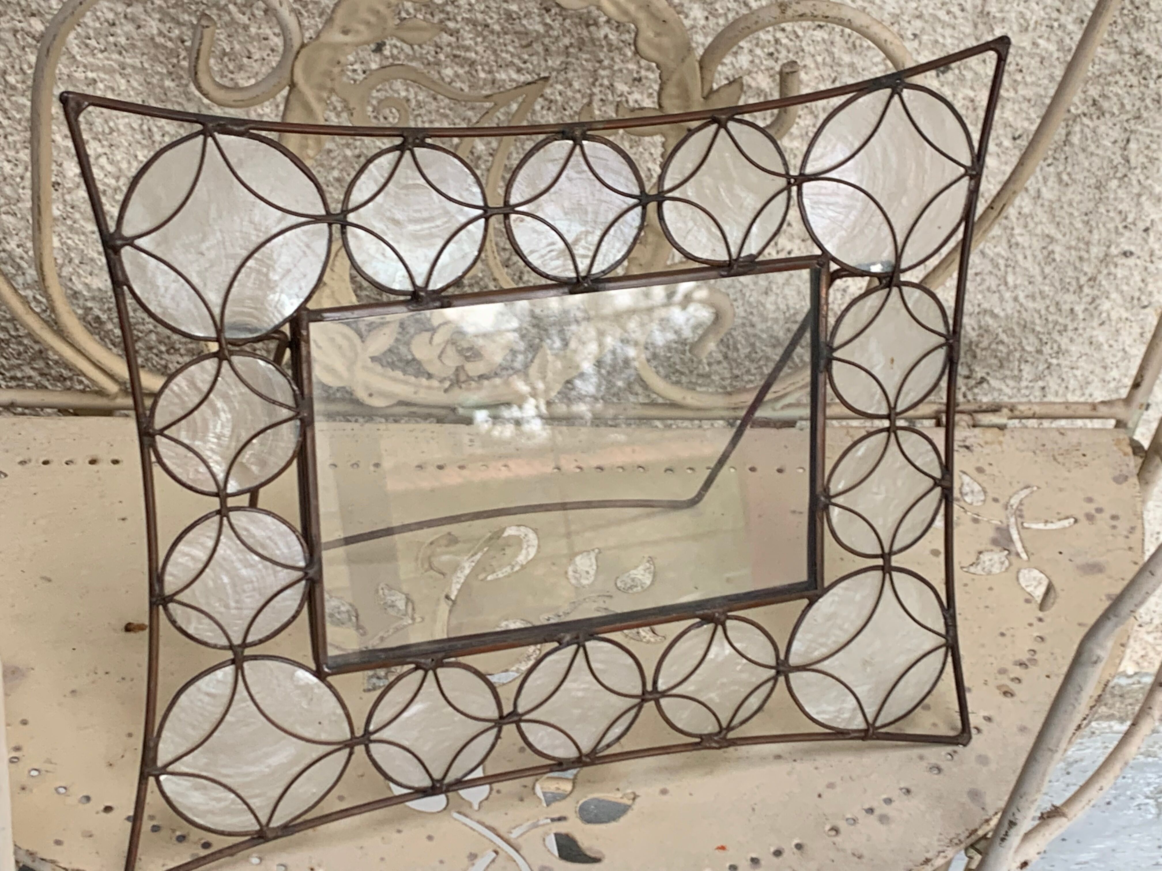 Metal frame and mother-of-pearl design and vintage