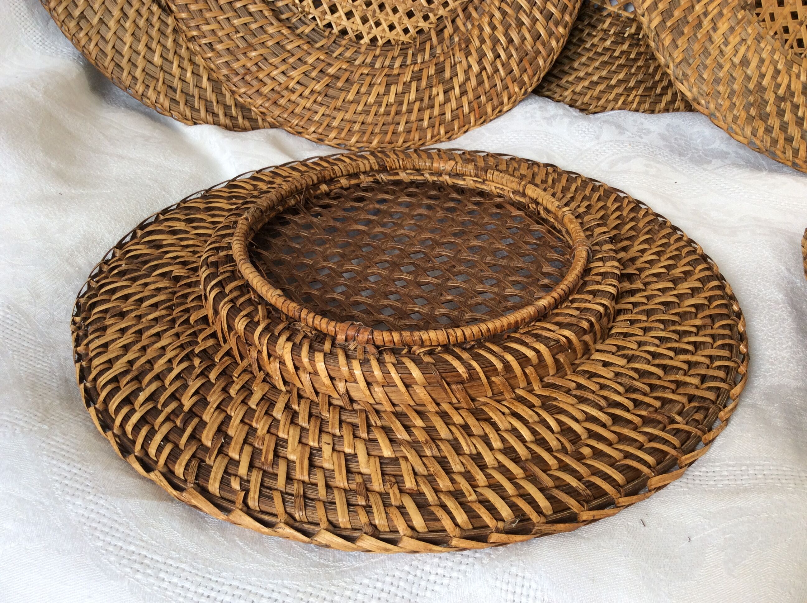 Ten rattan plates, basketry, wicker