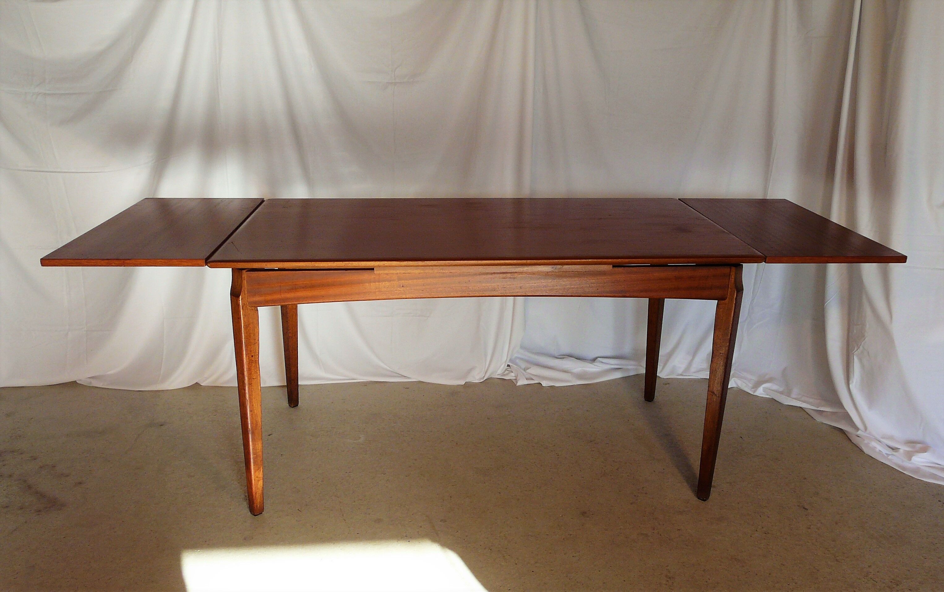 Scandinavian extendable rectangular teak table