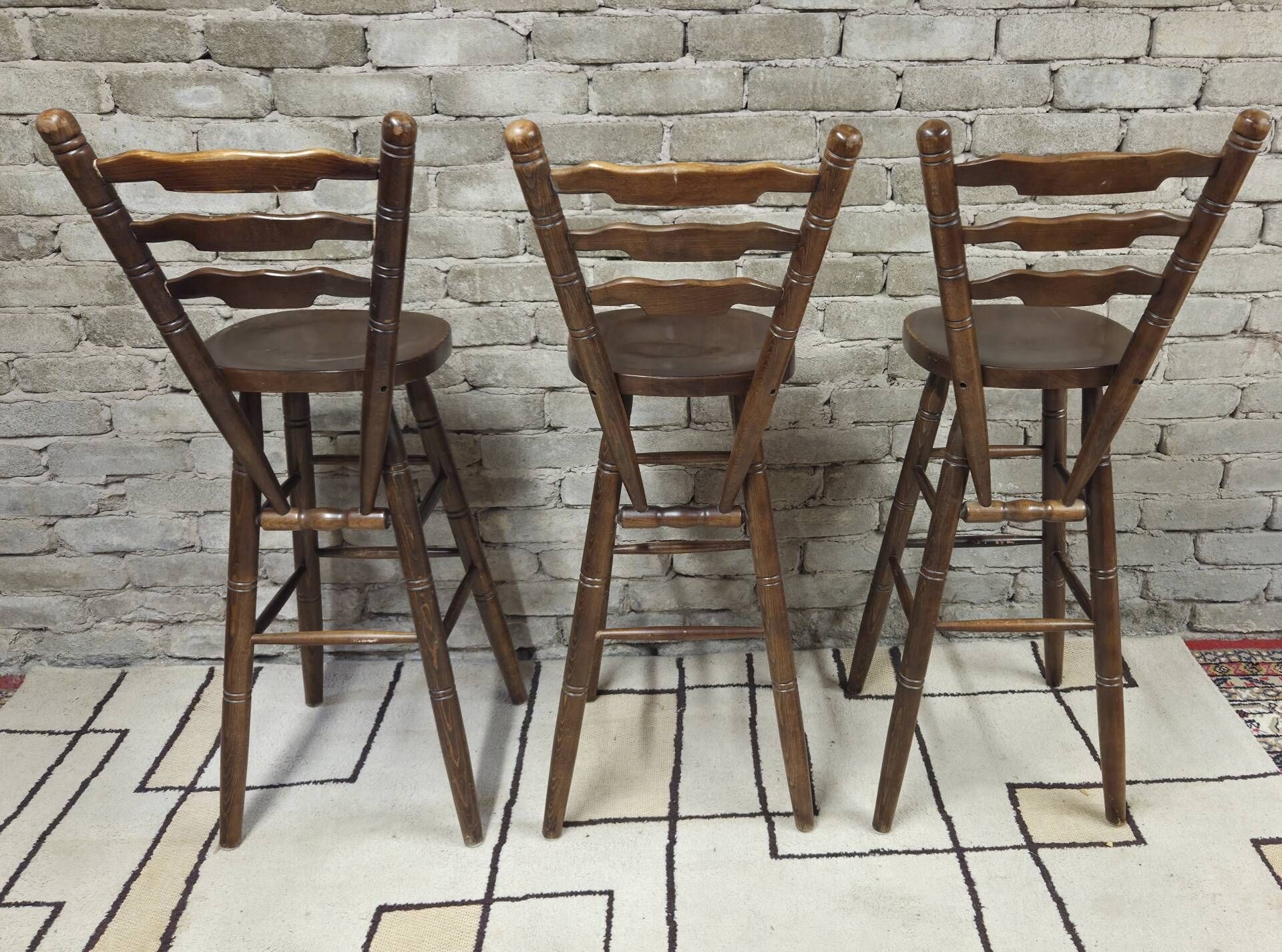 3 vintage wooden bar stools from the 60s/70s with a bistro spirit.