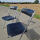 Set of 2 vintage folding chairs by the brand Souvignet.