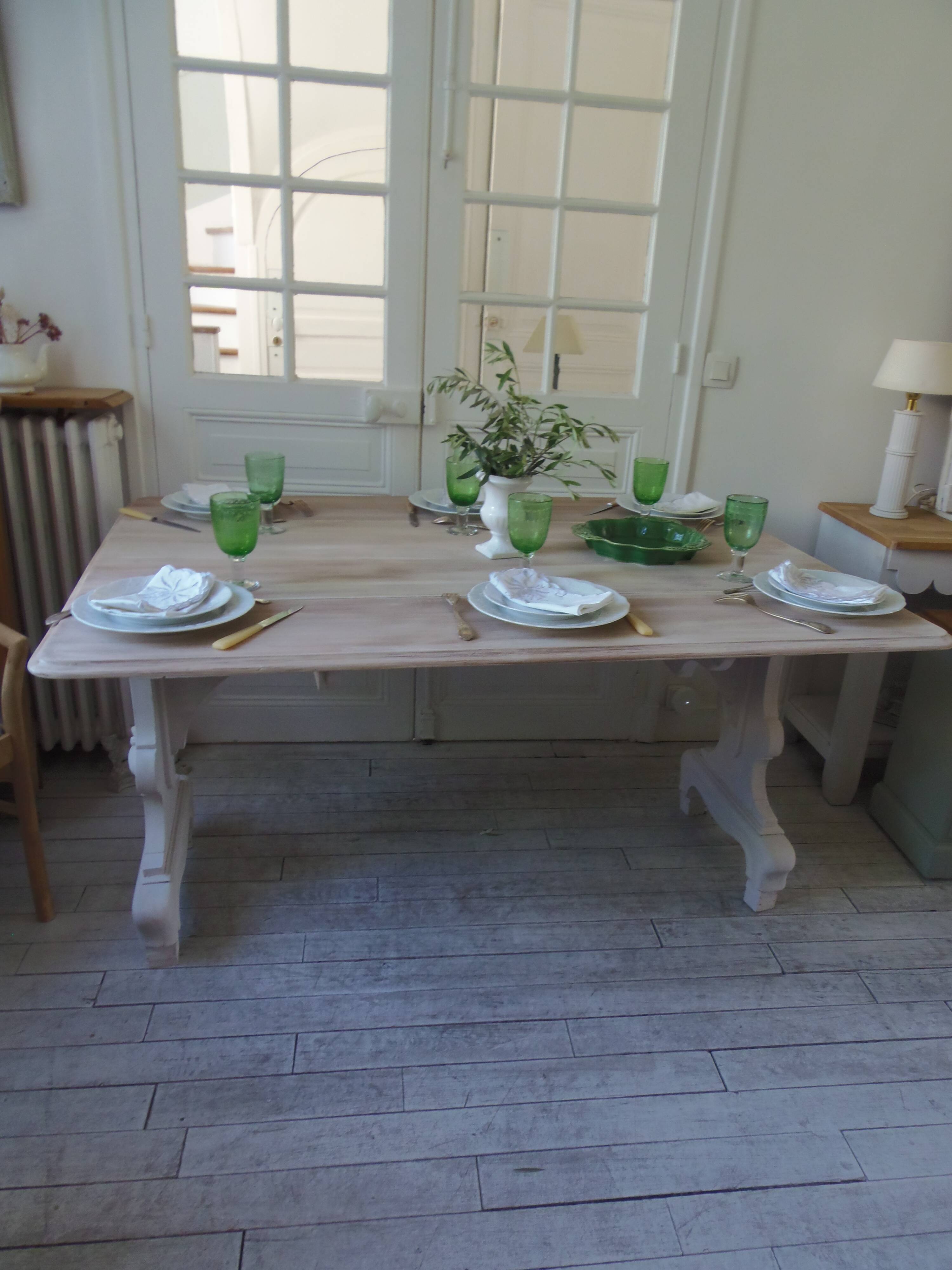 Console, solid walnut table, foldable extensions, grey patinated legs.