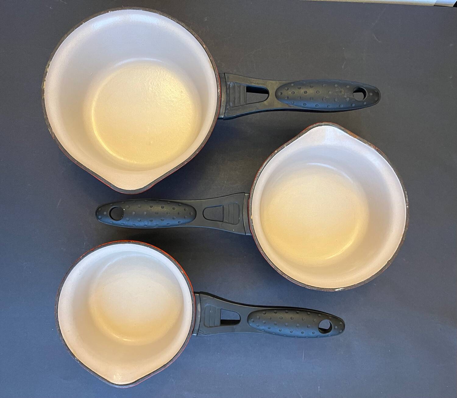Series of 3 cast iron Le Creuset saucepans
