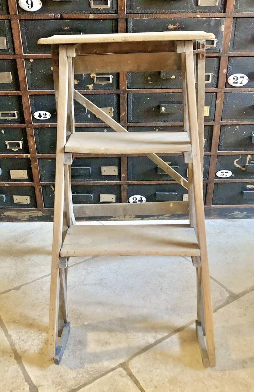 Old small painter's stepladder, wooden trade furniture, step stool