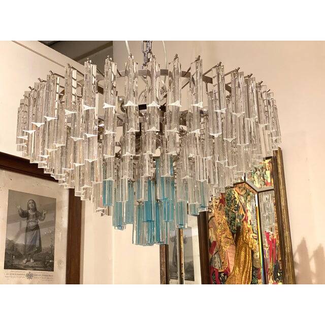 Contemporary transparent and ligh-blue triedro murano glass chandelier