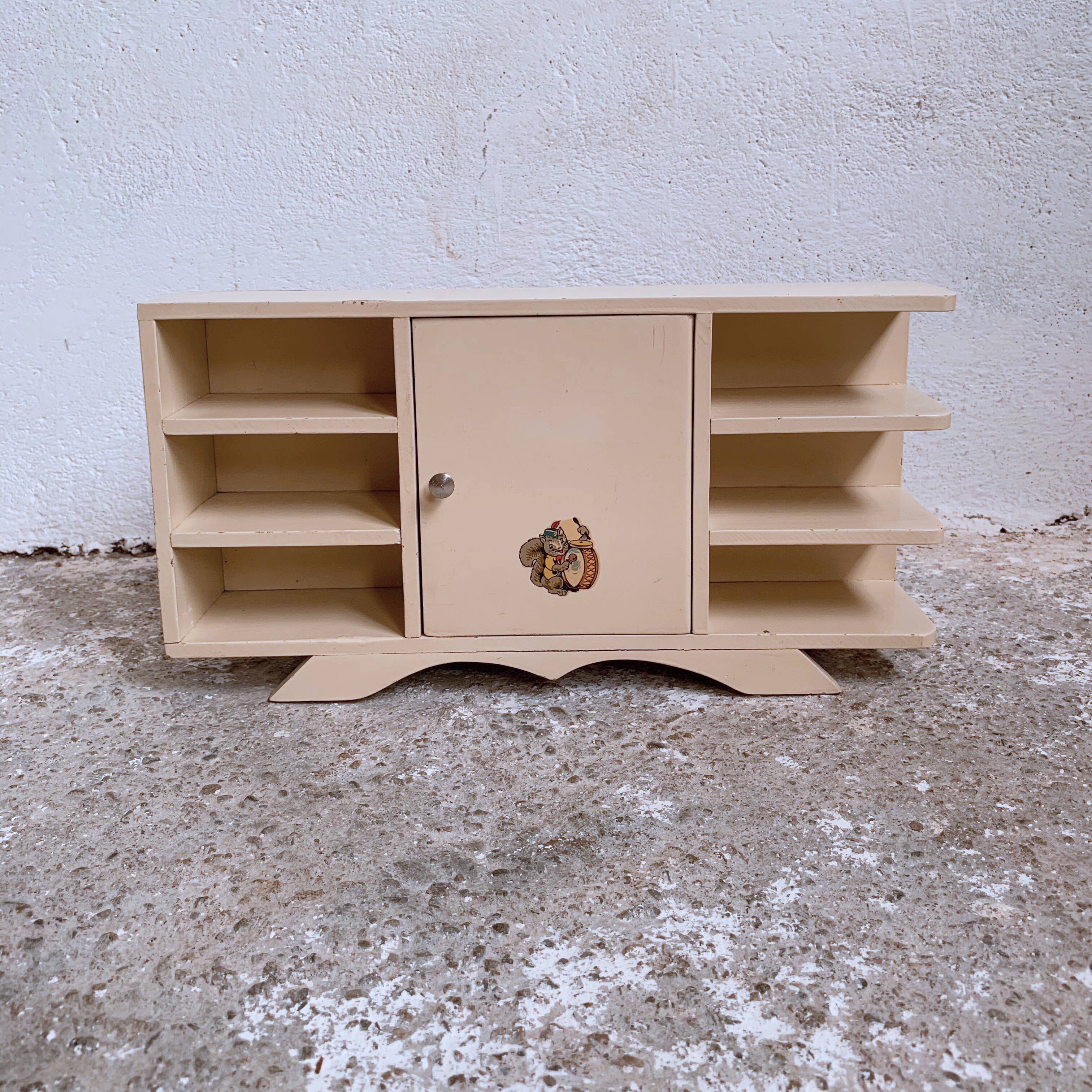 Old doll row wardrobe