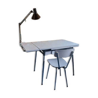 Extendable formica table and vintage 1960s chairs.