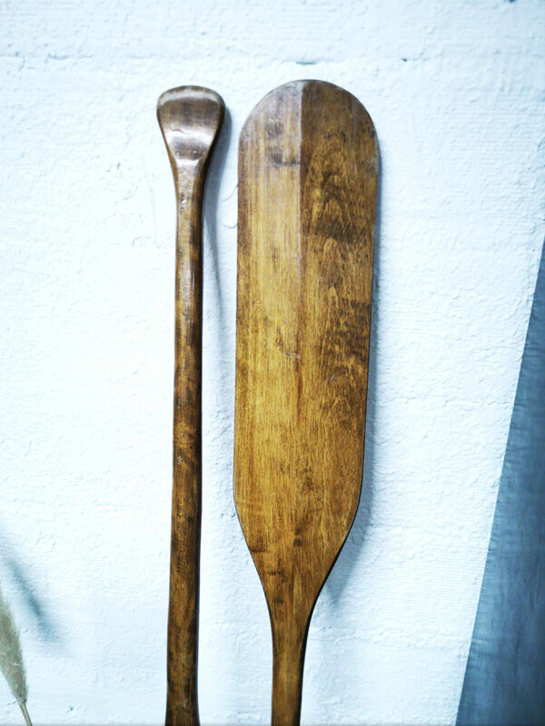 Pair of old wooden oars