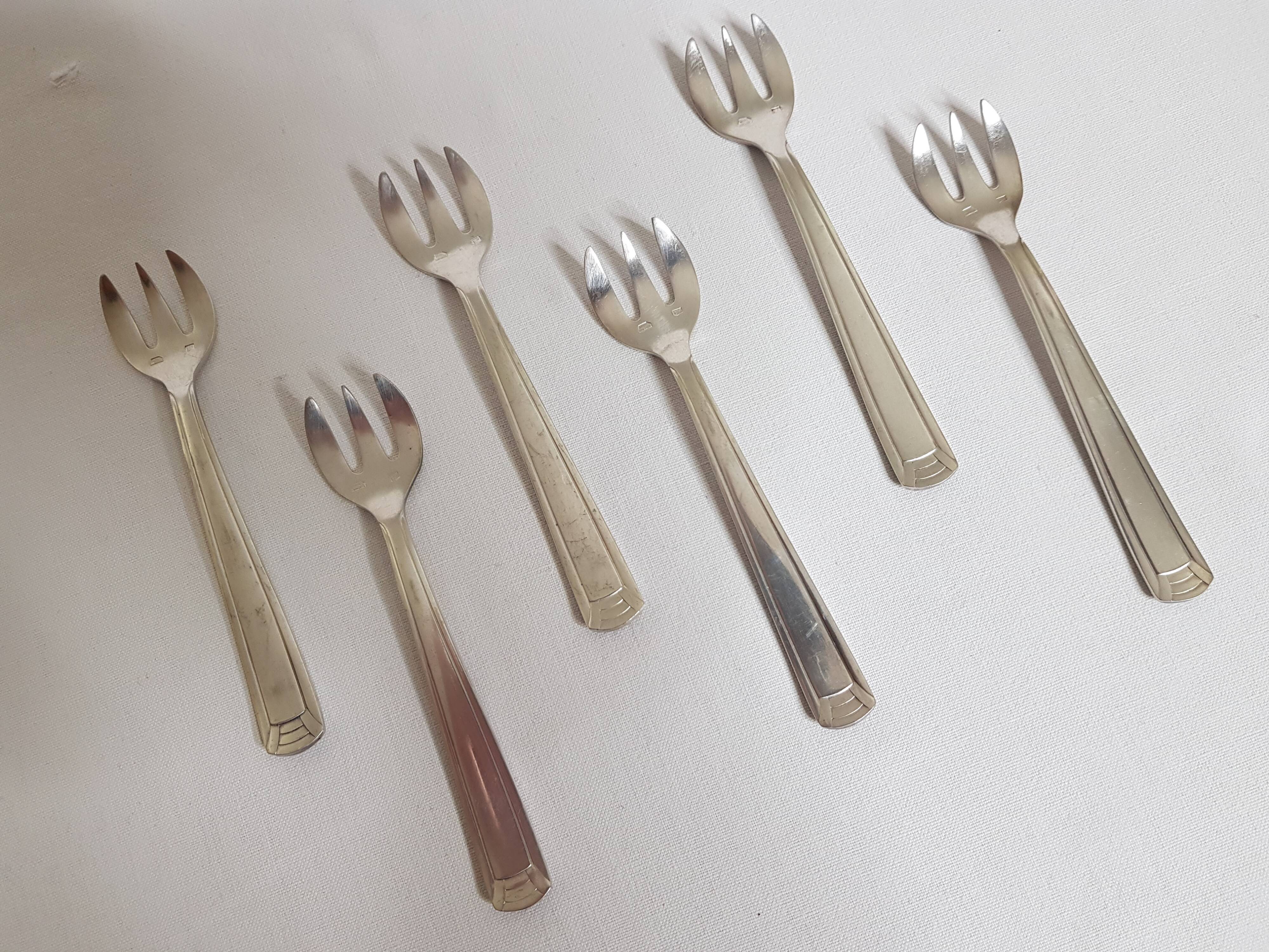 Six art deco silver metal oyster forks