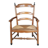 Large fauteuil paillé