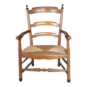 Large straw armchair