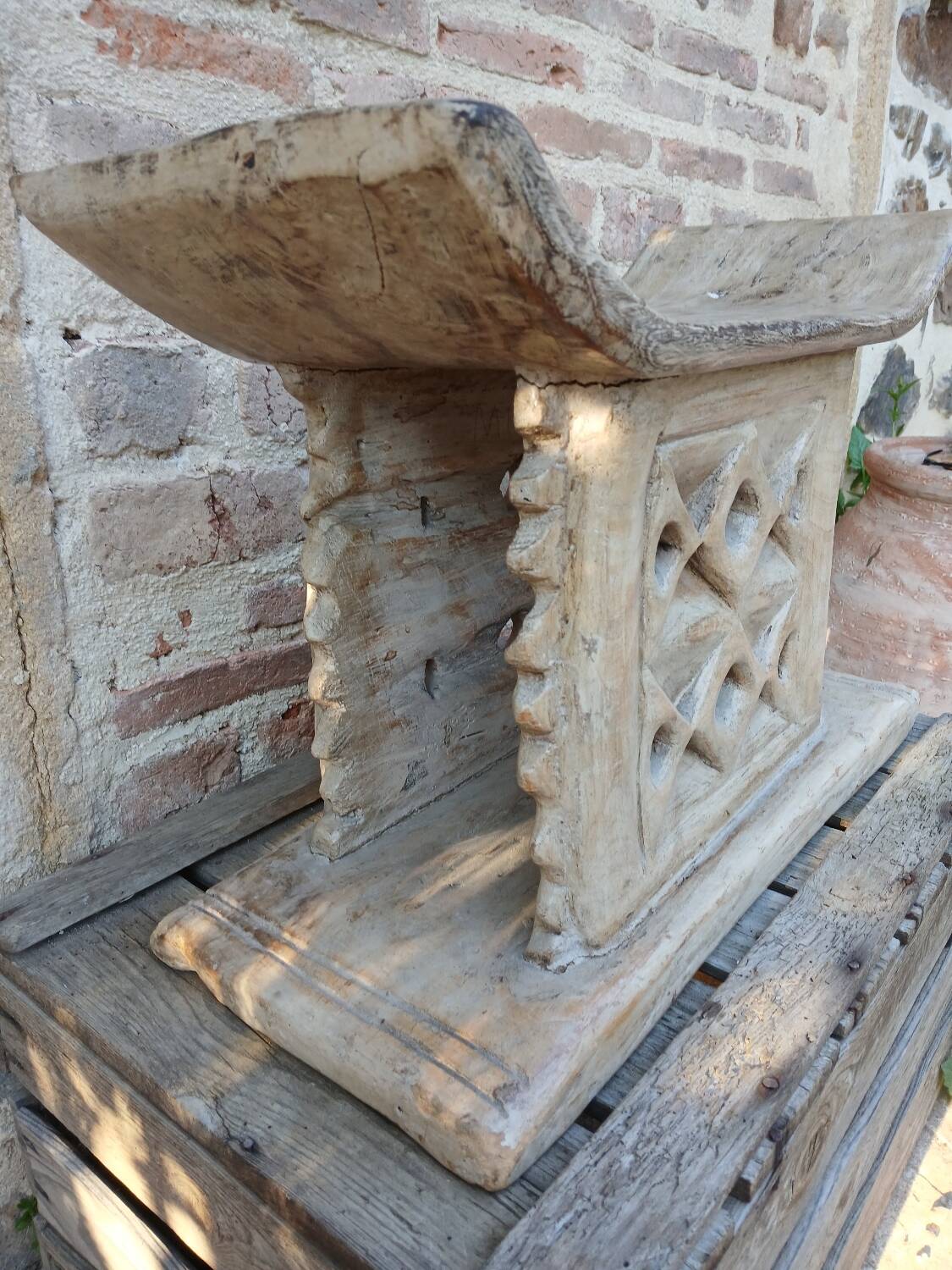 2 African carved wooden stools