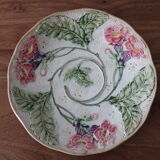 Assiette en barbotine ancienne