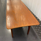 Teak coffee table with under top circa 1960