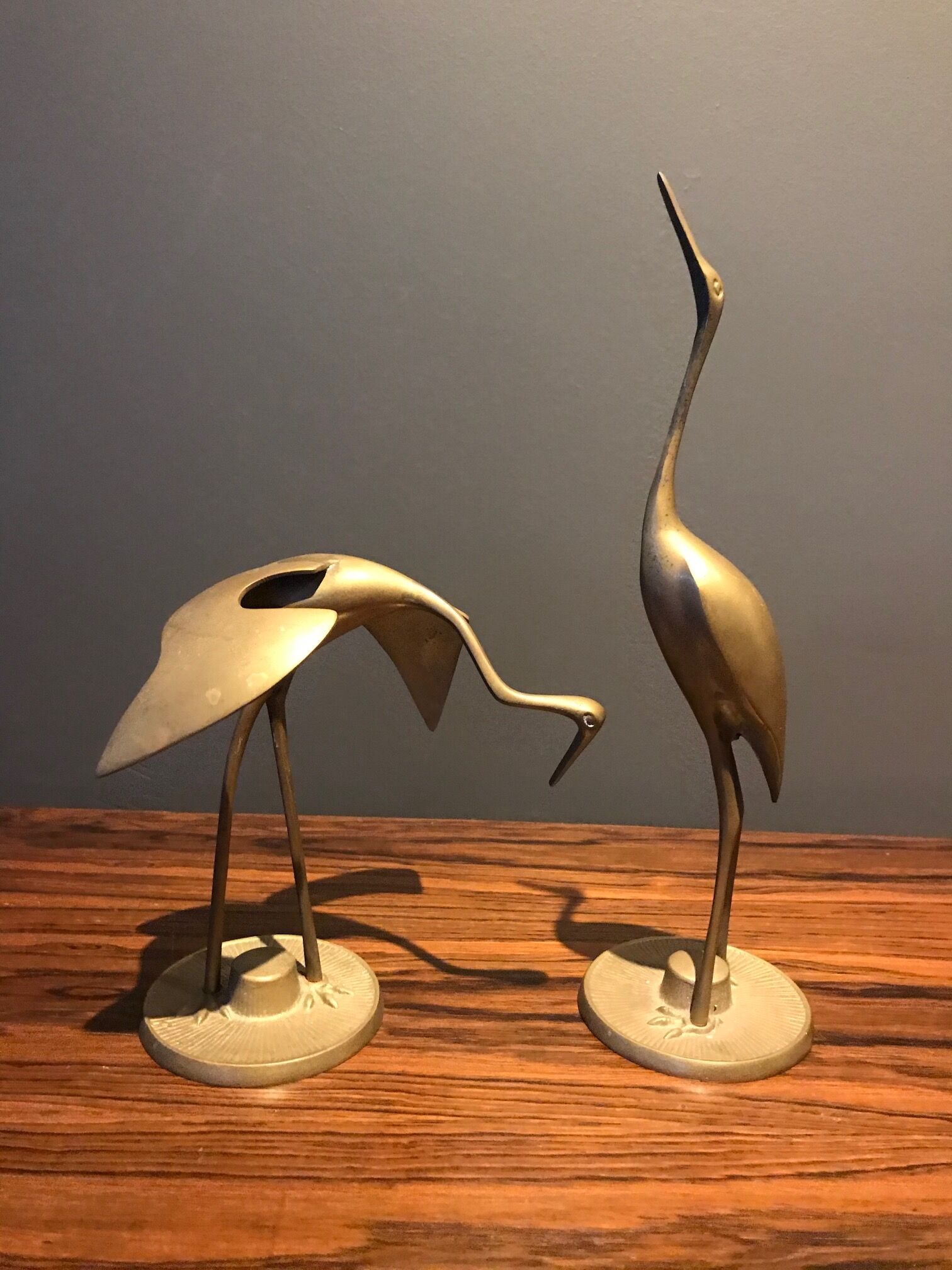 Pair of brass deco stork