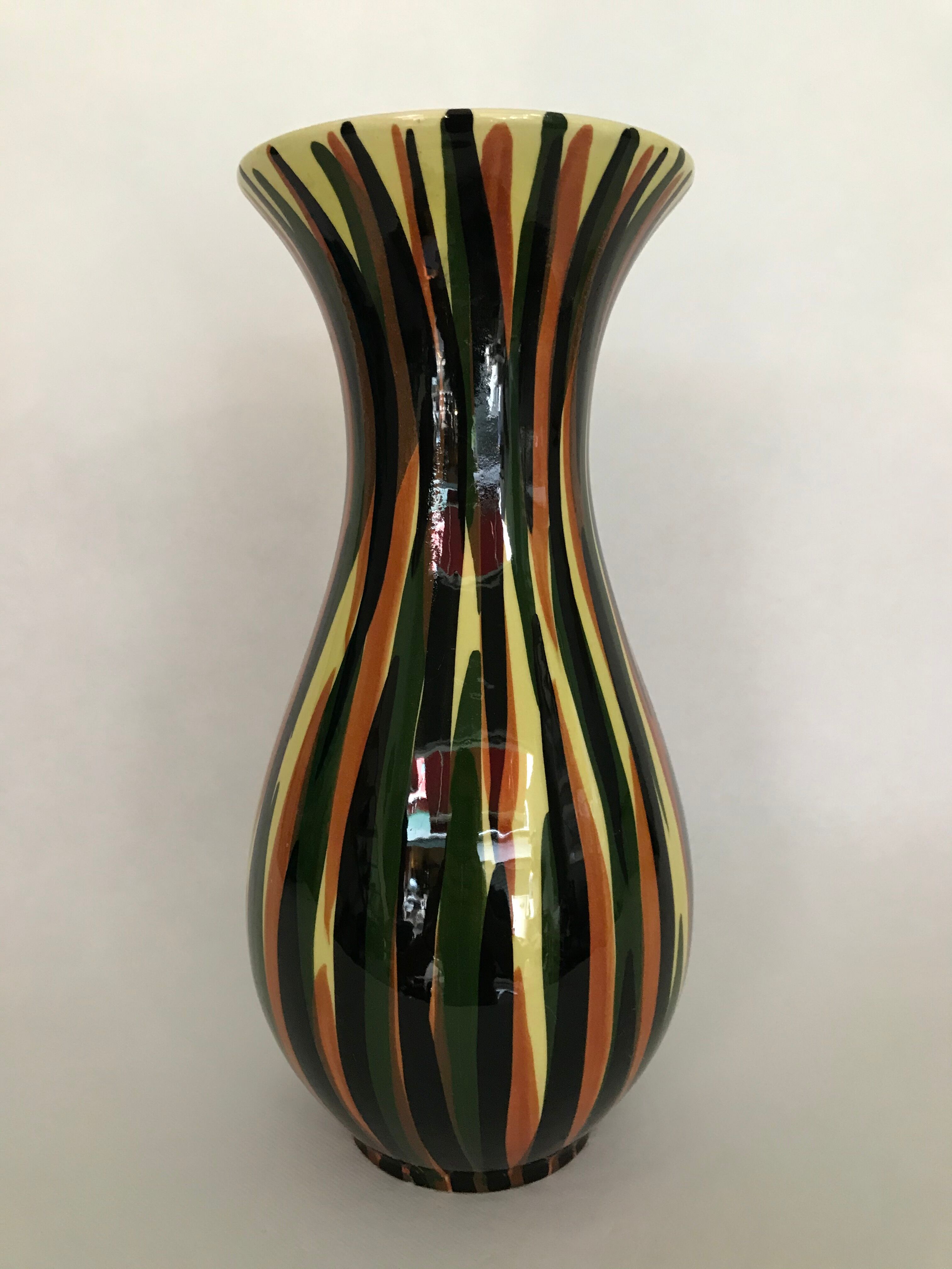 Saint Clement's diabolo vase, decorated with hand-painted polychrome flames, numbered 1950/1960