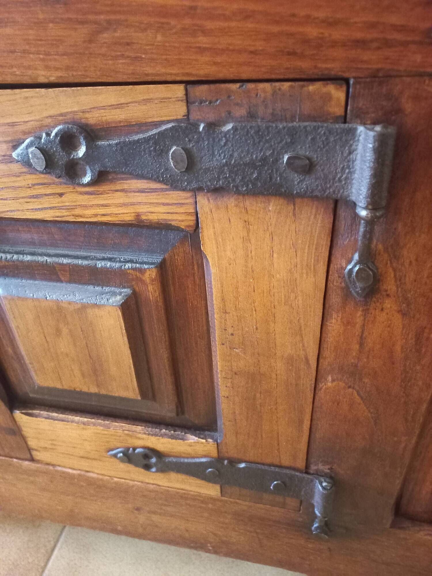 Old solid wood dough mixer carefully transformed into a bar cabinet.