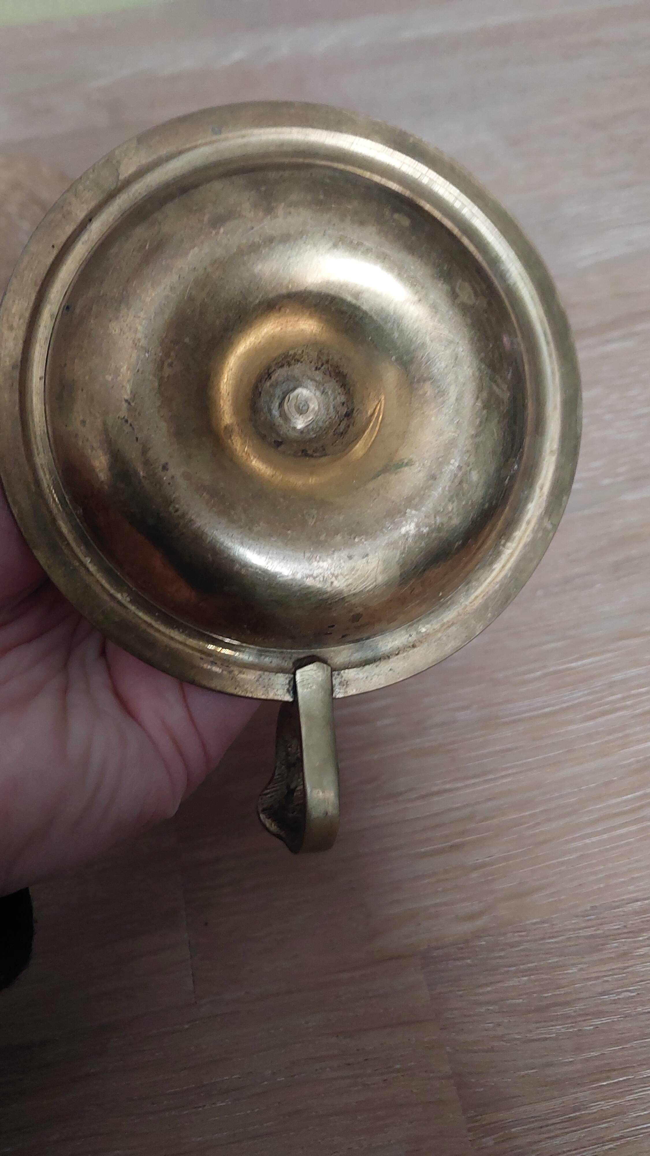 Antique brass candle holder