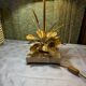 Bronze and travertine water lily lamp attributed to Maison Charles, 1970s.