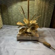 Bronze and travertine water lily lamp attributed to Maison Charles, circa 1970.